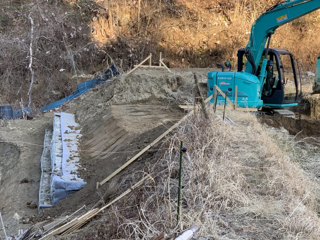 Y村 災害復旧工事 土運搬・法面 三島建設株式会社