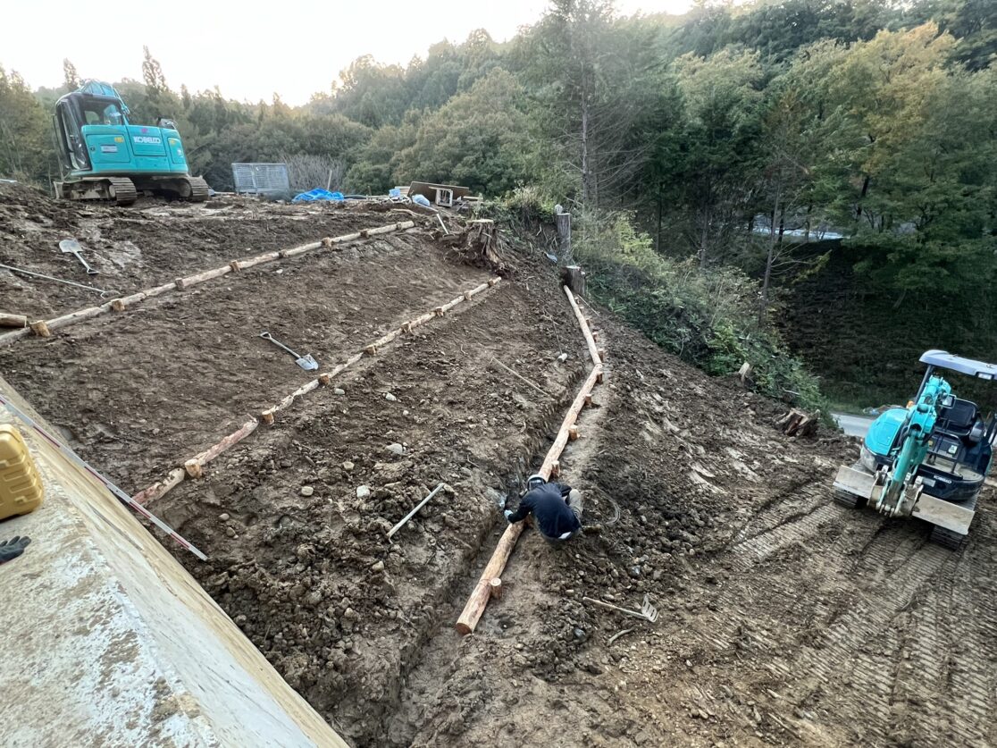 T村 土木工事 続き掘削・丸太 三島建設株式会社